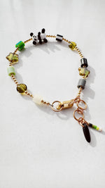 Load image into Gallery viewer, Golden Critter Bracelet - panda - glow / grey
