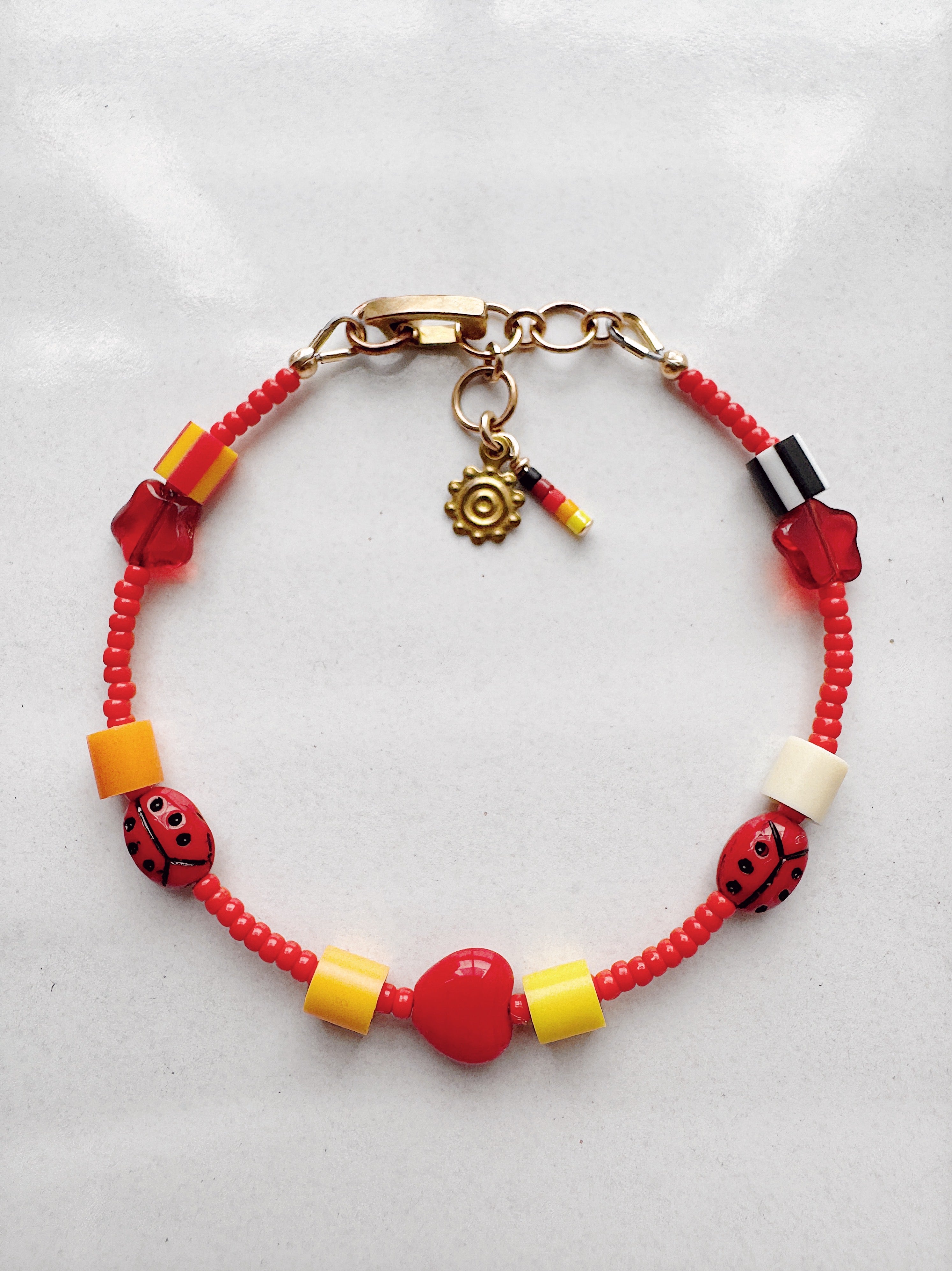 ToyBoxCritter Bracelet - matte red ladybugs 001