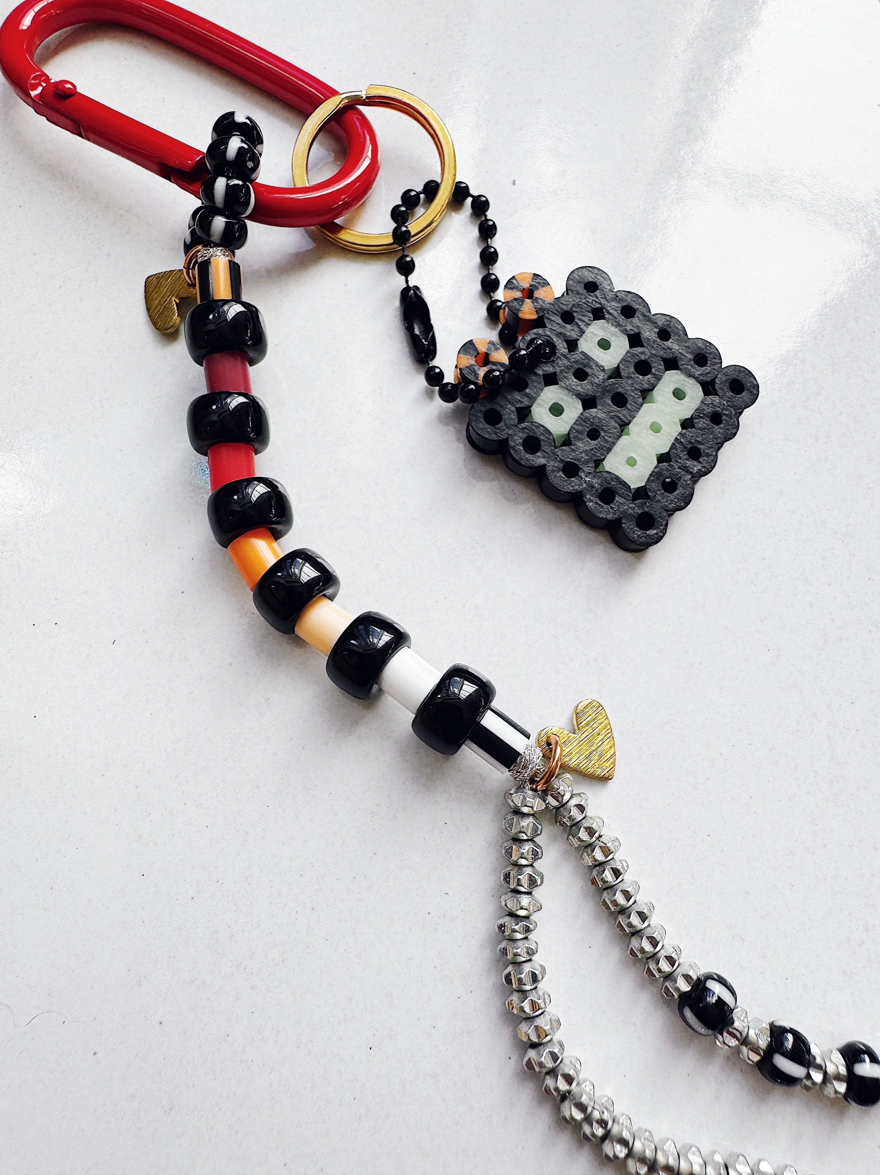 Keychain with beads and charms on a white background