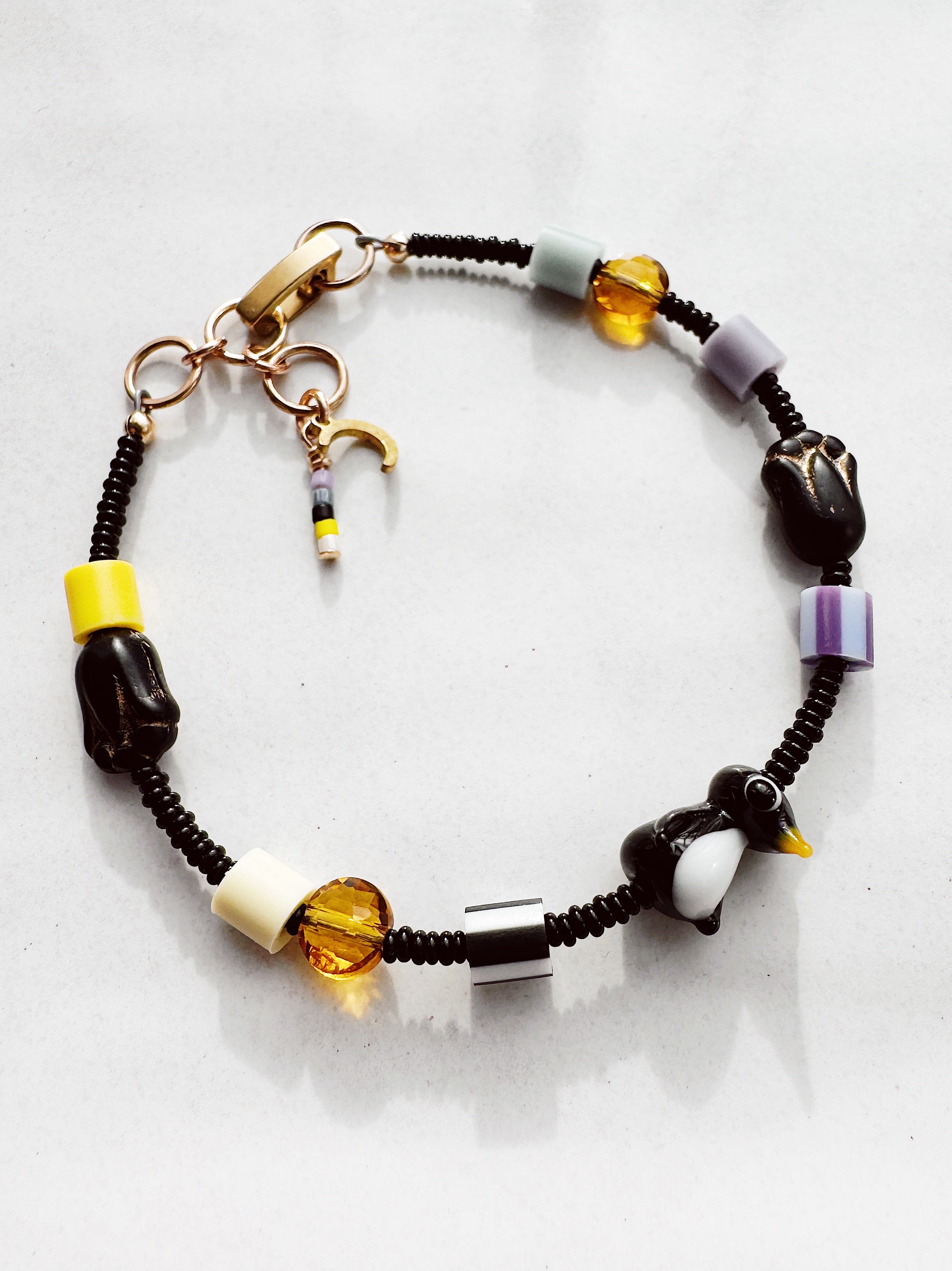 Critter Bracelet - black penguin - dusk / yellow