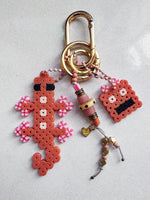 Load image into Gallery viewer, RoboLizard Bag Charm - gold / pink
