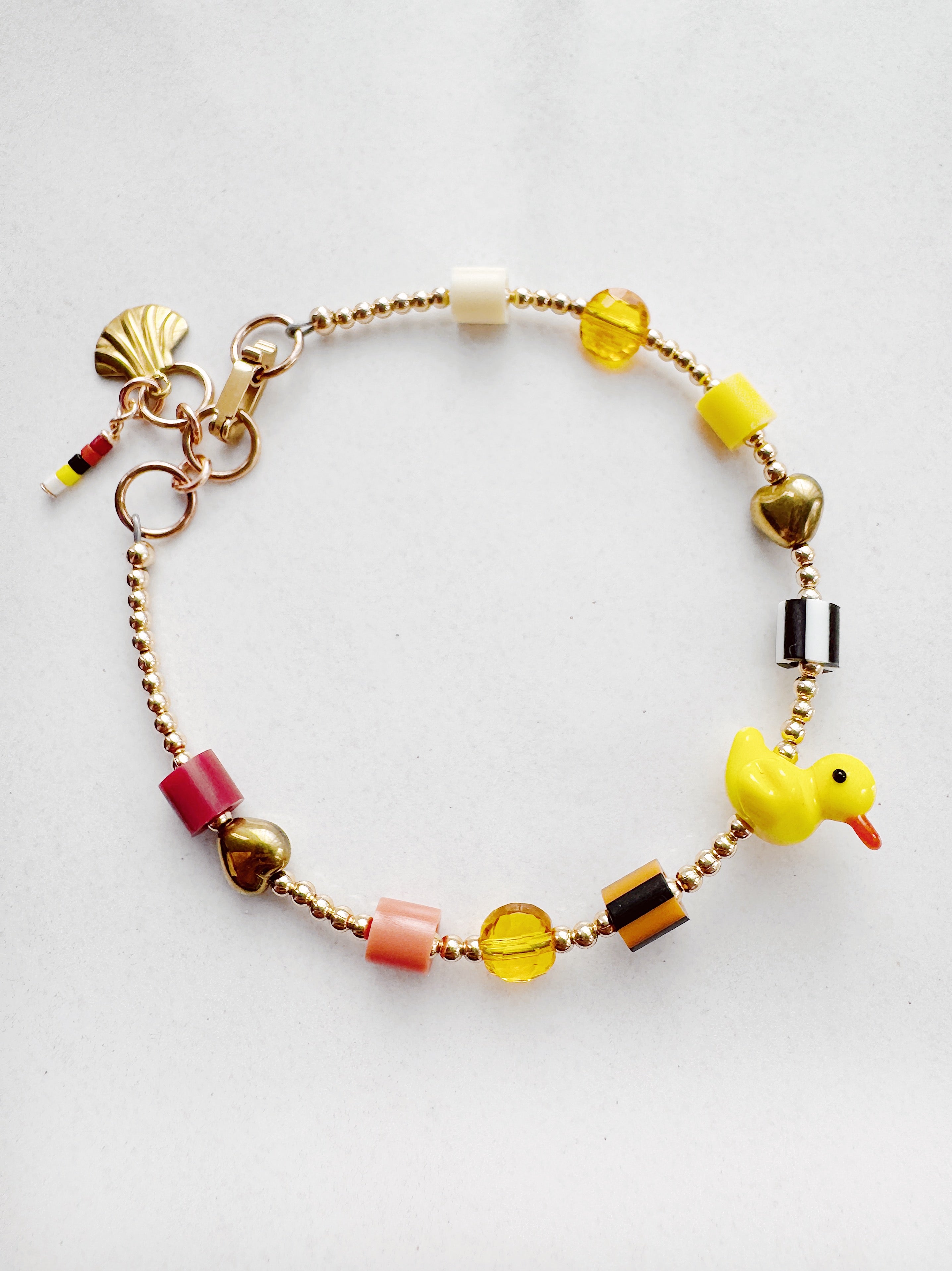 Golden Critter Bracelet - yellow duck - brick / moon