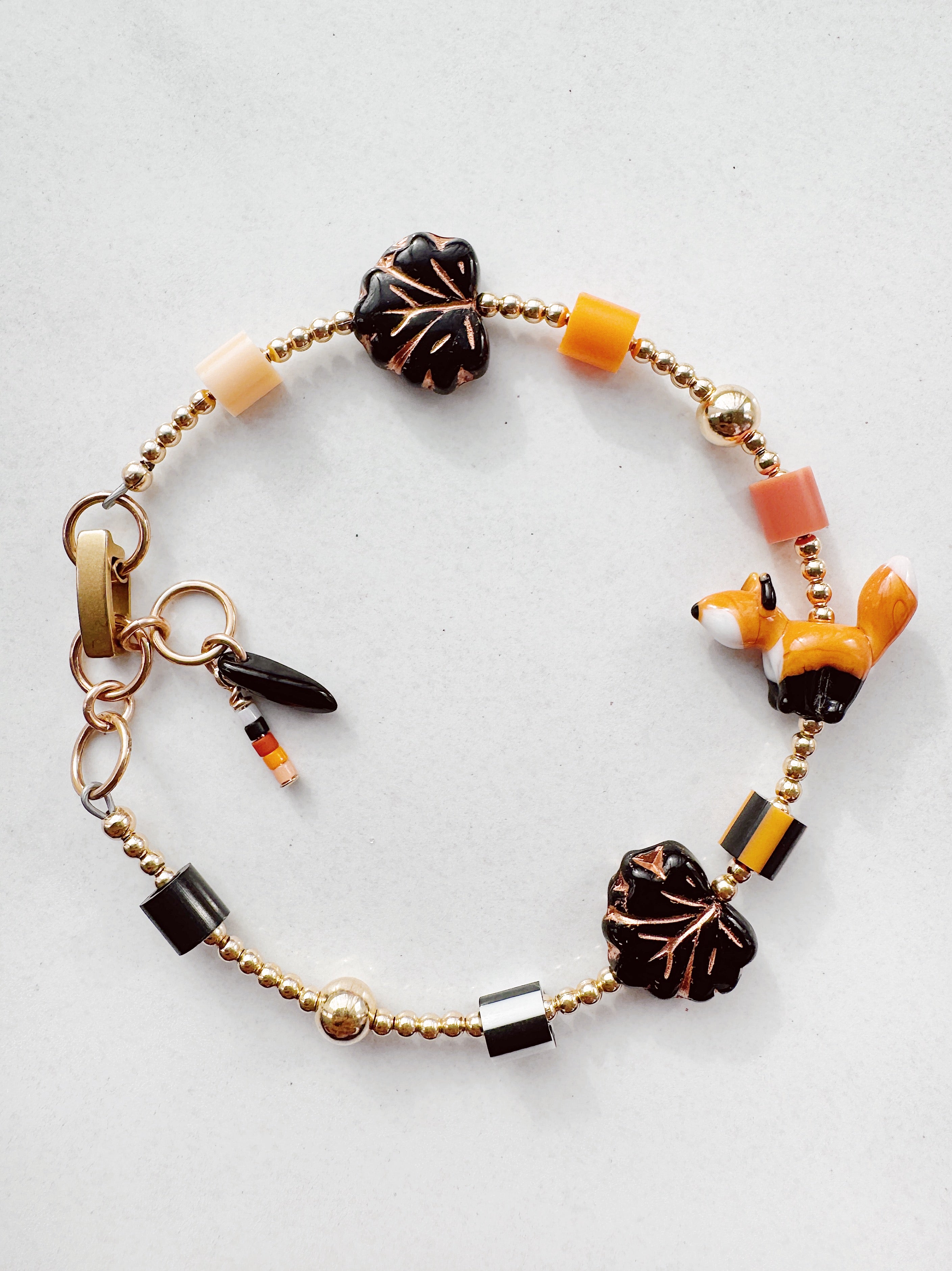 Golden Critter Bracelet - red fox - black / peach