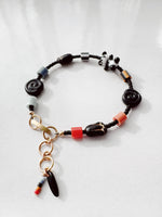 Load image into Gallery viewer, Critter Bracelet - black panda - dusk / red

