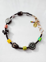 Load image into Gallery viewer, Critter Bracelet - black tuxie kitty - zebra / grass
