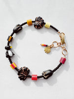 Load image into Gallery viewer, Critter Bracelet - black penguin - brick / lemon
