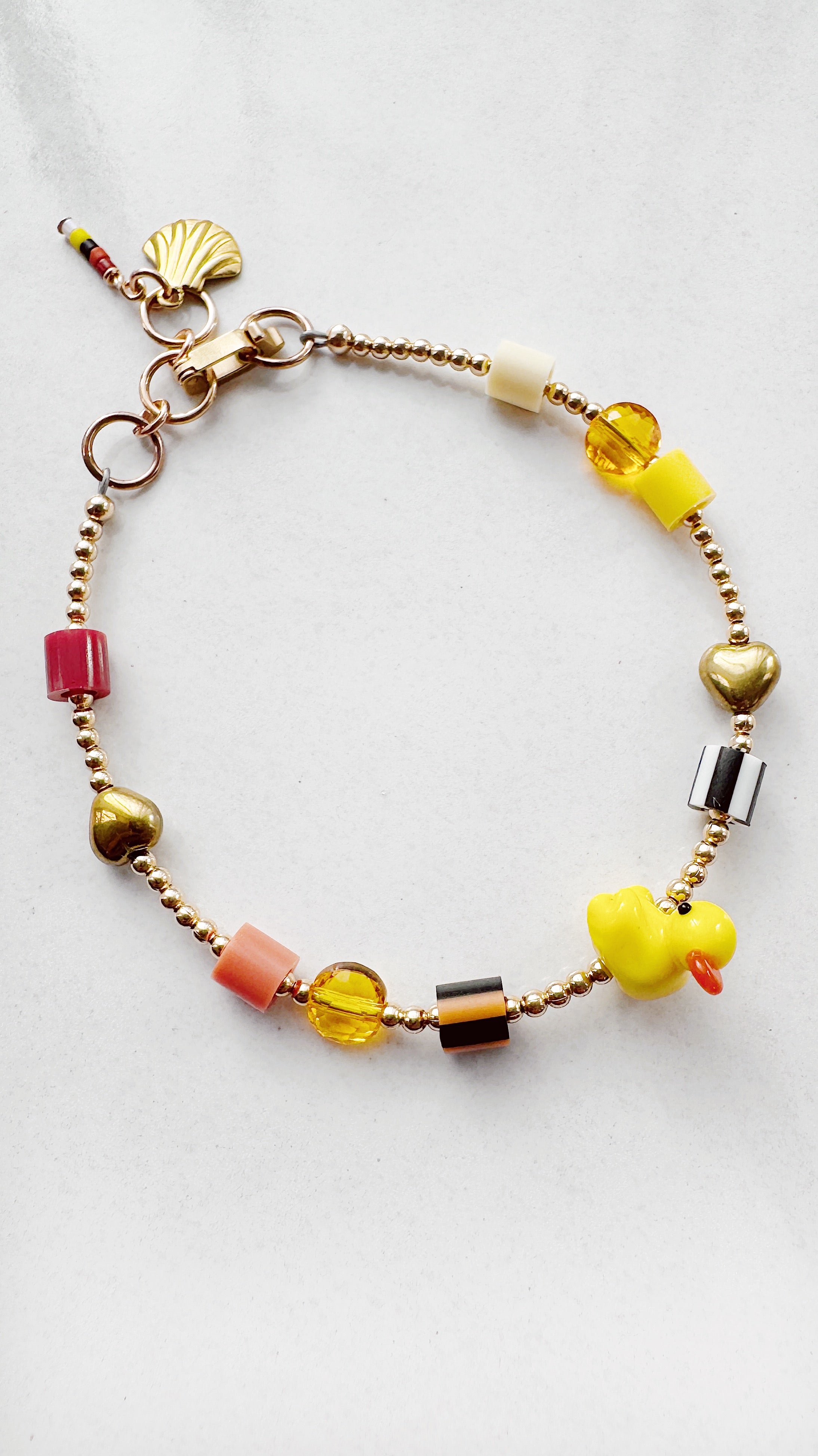 Golden Critter Bracelet - yellow duck - brick / moon