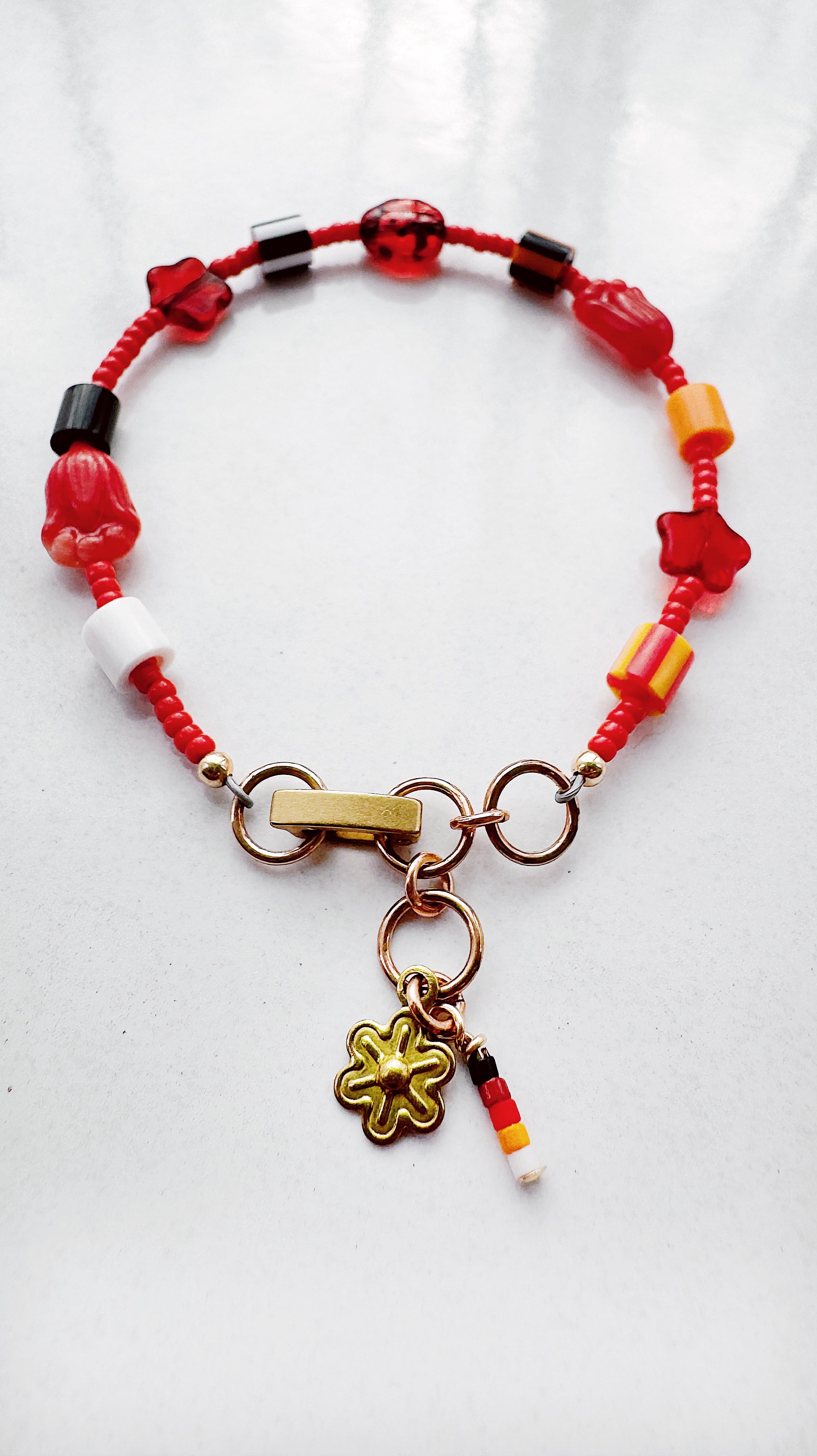 Critter Bracelet - red ladybug - flame / white