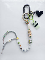 Load image into Gallery viewer, XXXL Long Bag Charm - green swirl skull + surprise!
