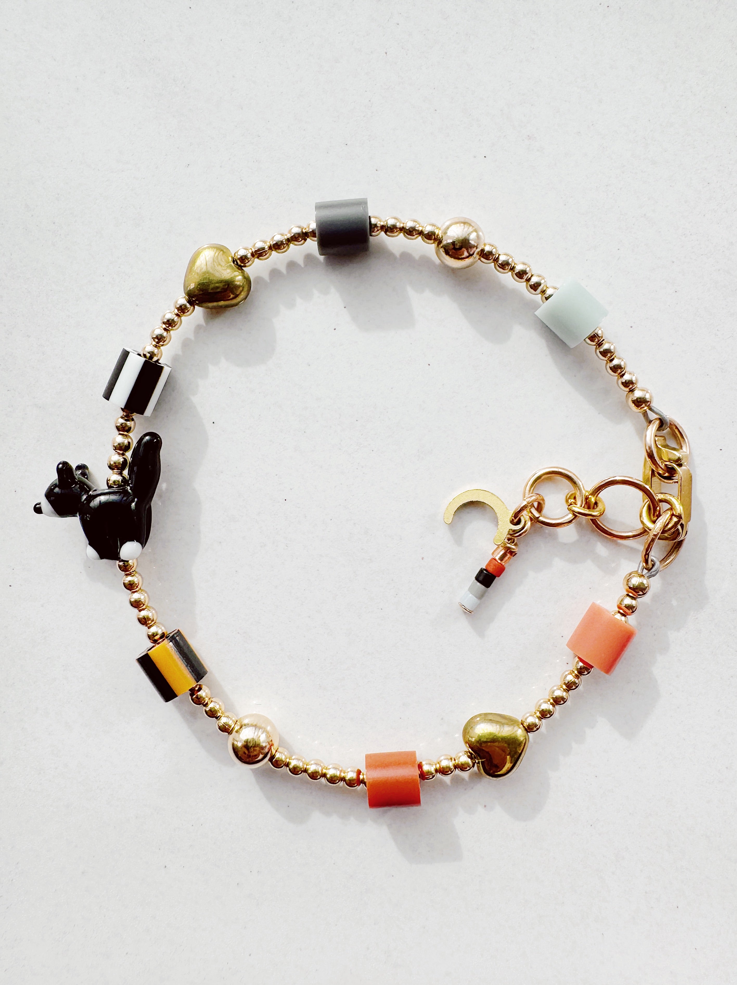 Golden Critter Bracelet - tuxie kitty - dusk / persimmon