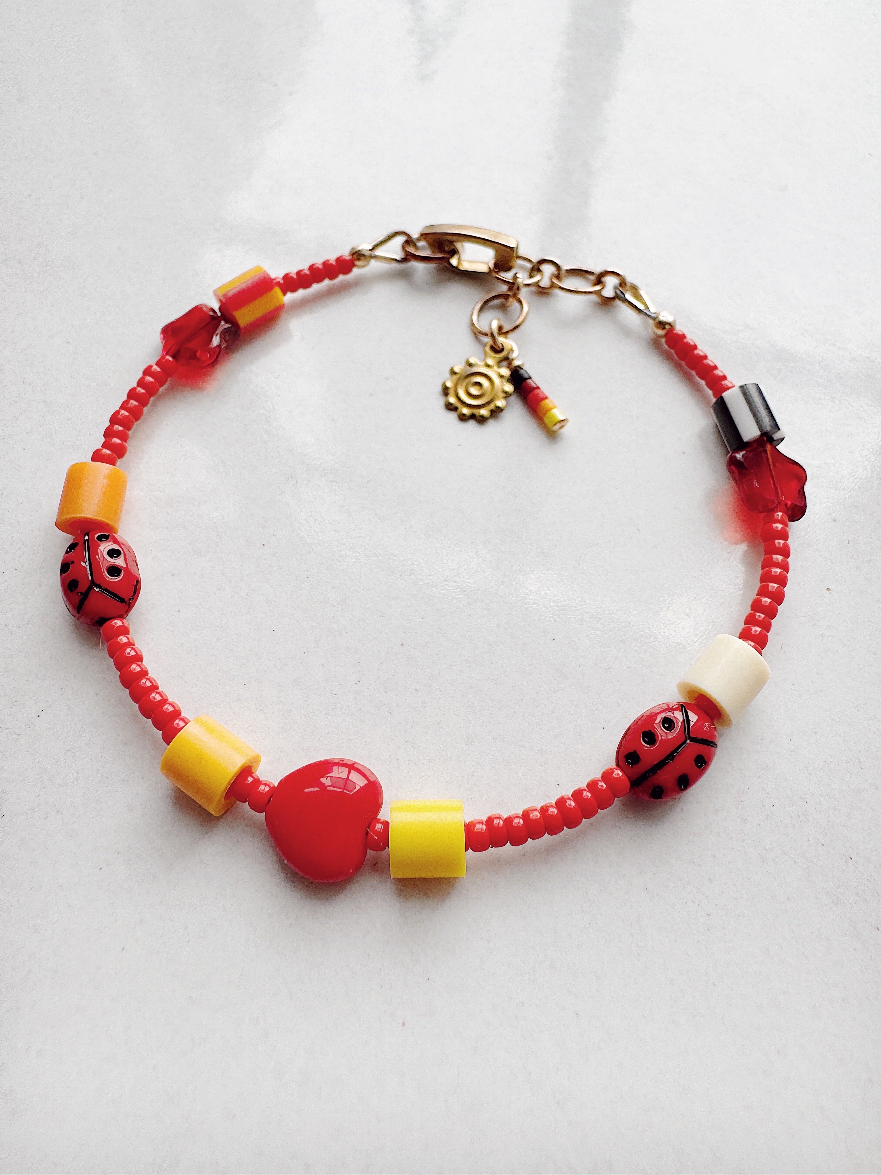 ToyBoxCritter Bracelet - matte red ladybugs 001