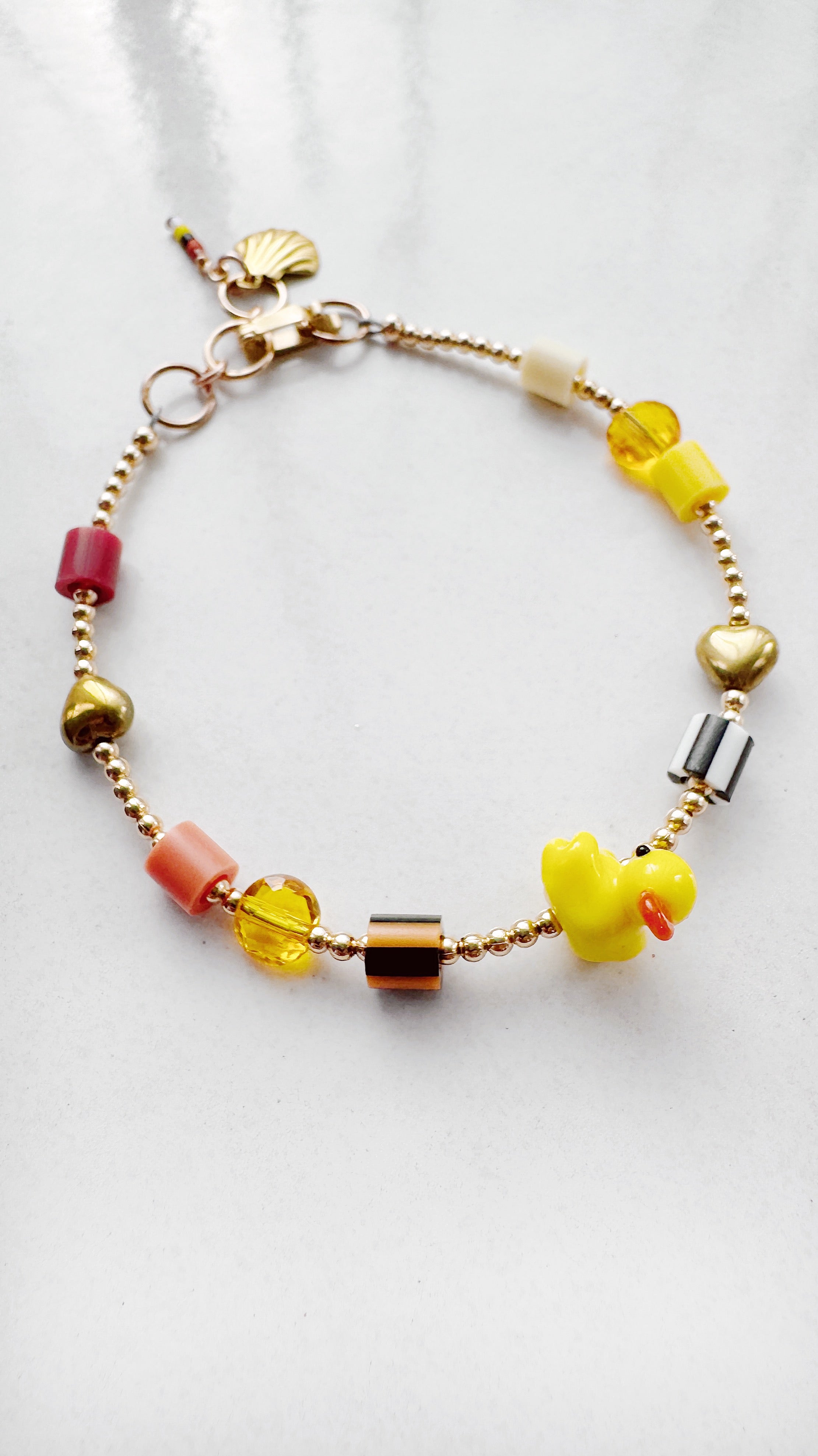 Golden Critter Bracelet - yellow duck - brick / moon