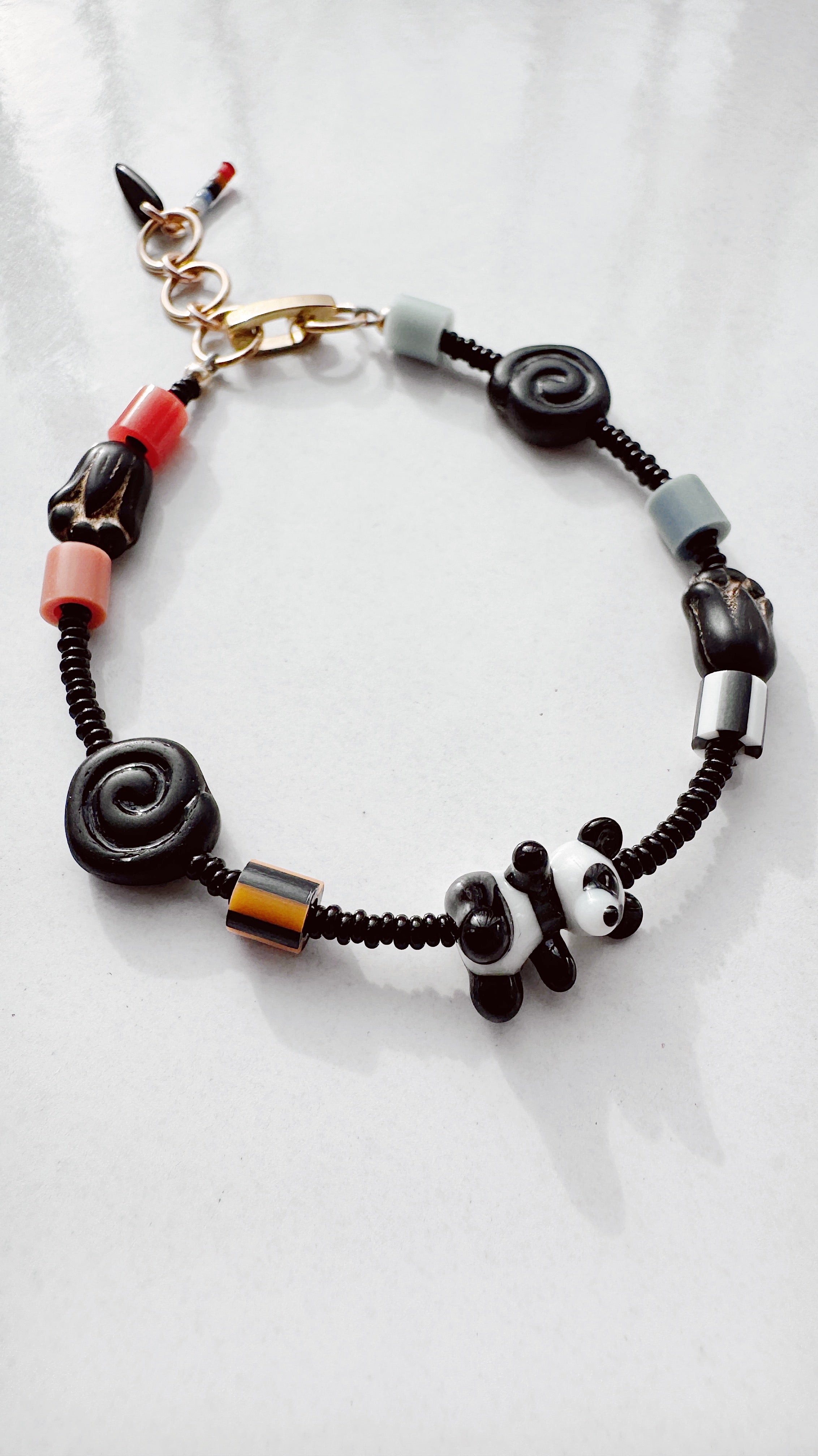 Critter Bracelet - black panda - dusk / red