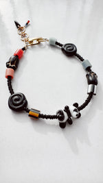 Load image into Gallery viewer, Critter Bracelet - black panda - dusk / red
