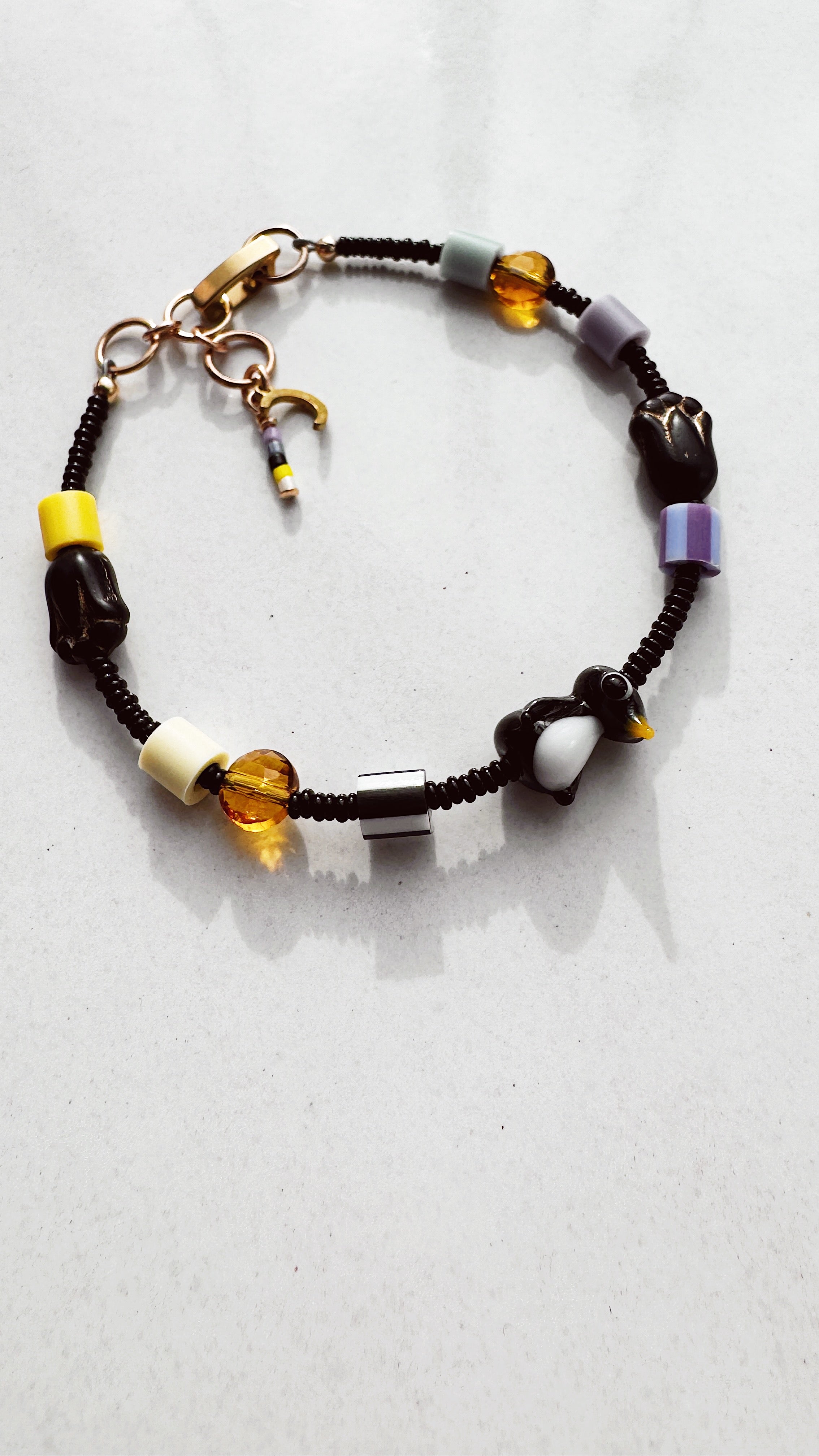 Critter Bracelet - black penguin - dusk / yellow