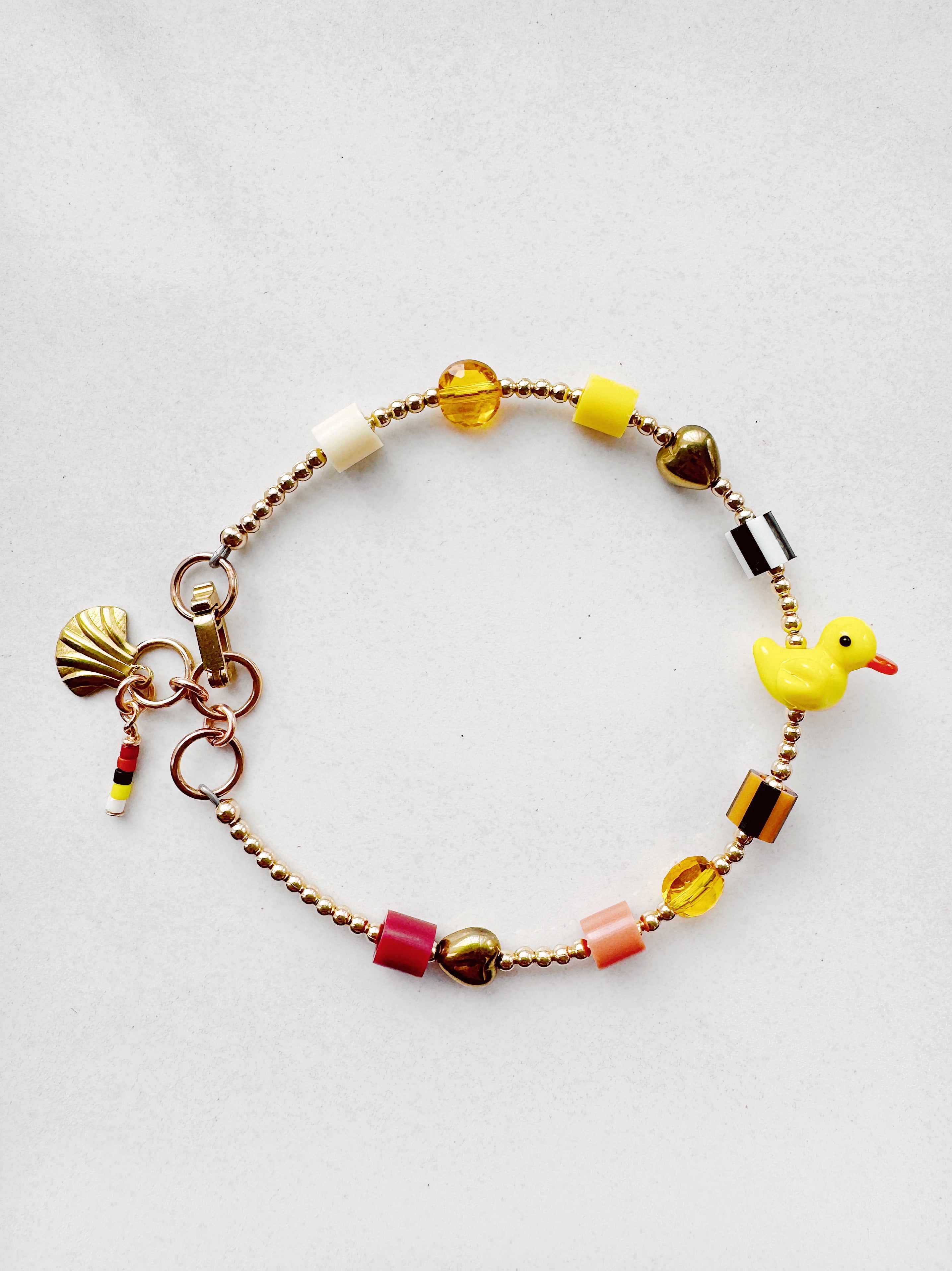 Golden Critter Bracelet - yellow duck - brick / moon