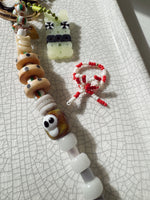 Load image into Gallery viewer, XXXL Long Bag Charm - green swirl skull + surprise!
