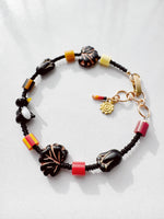 Load image into Gallery viewer, Critter Bracelet - black penguin - brick / lemon
