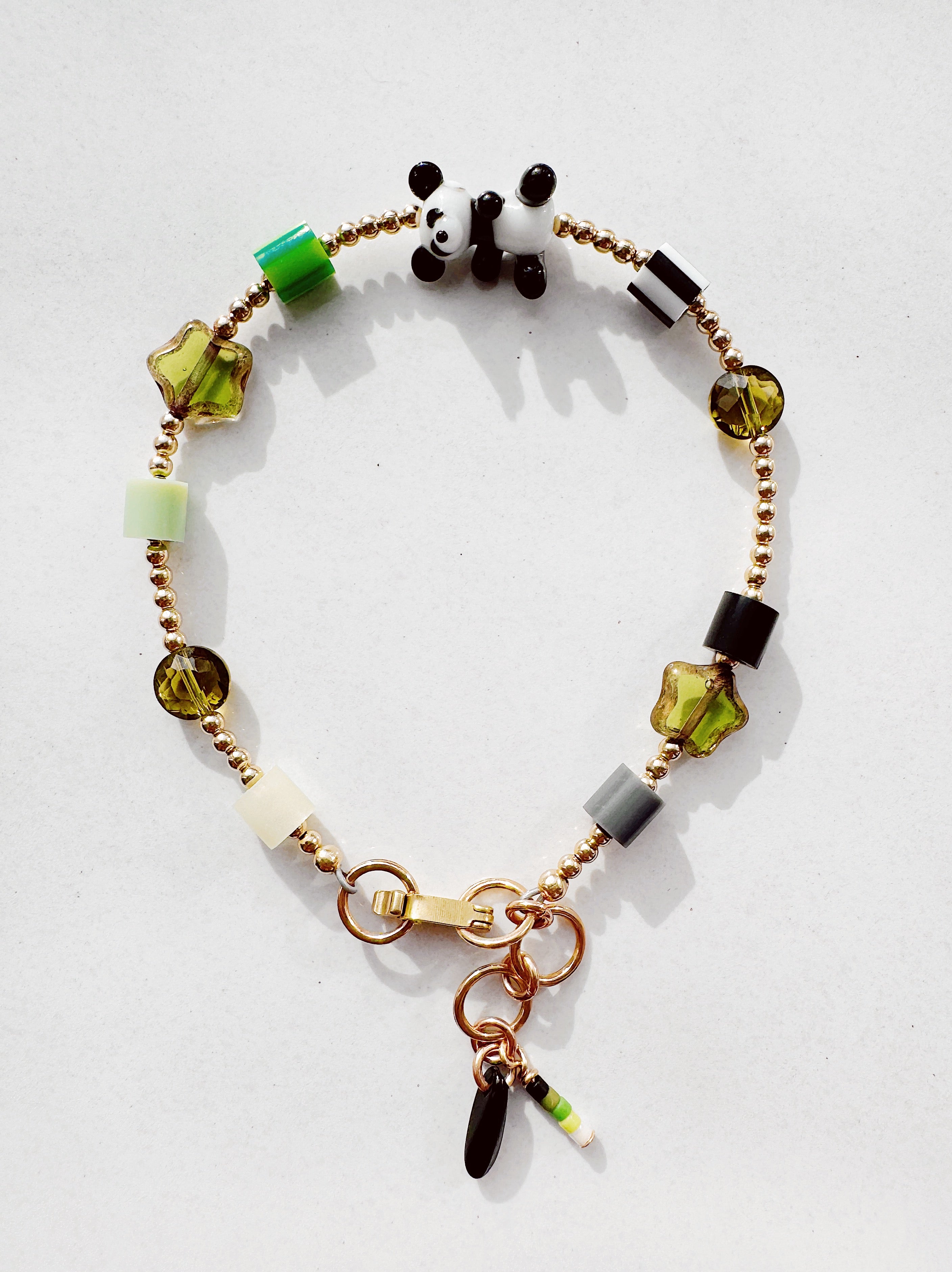 Golden Critter Bracelet - panda - glow / grey