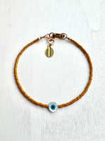 Load image into Gallery viewer, SOLO EVIL EYE BRACELET - merigold 💛 availability ends 10/29
