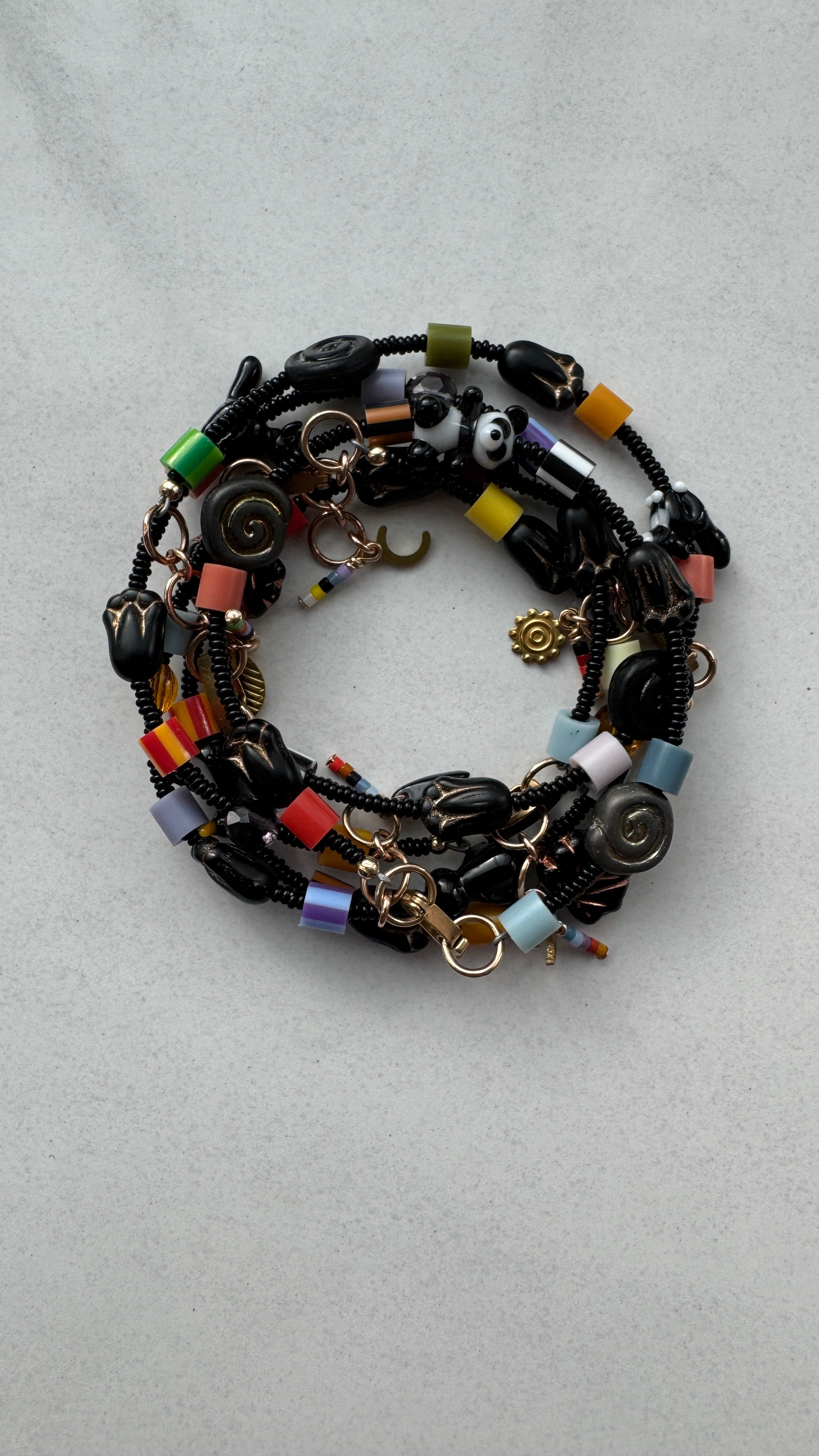 Critter Bracelet - black penguin - dusk / yellow