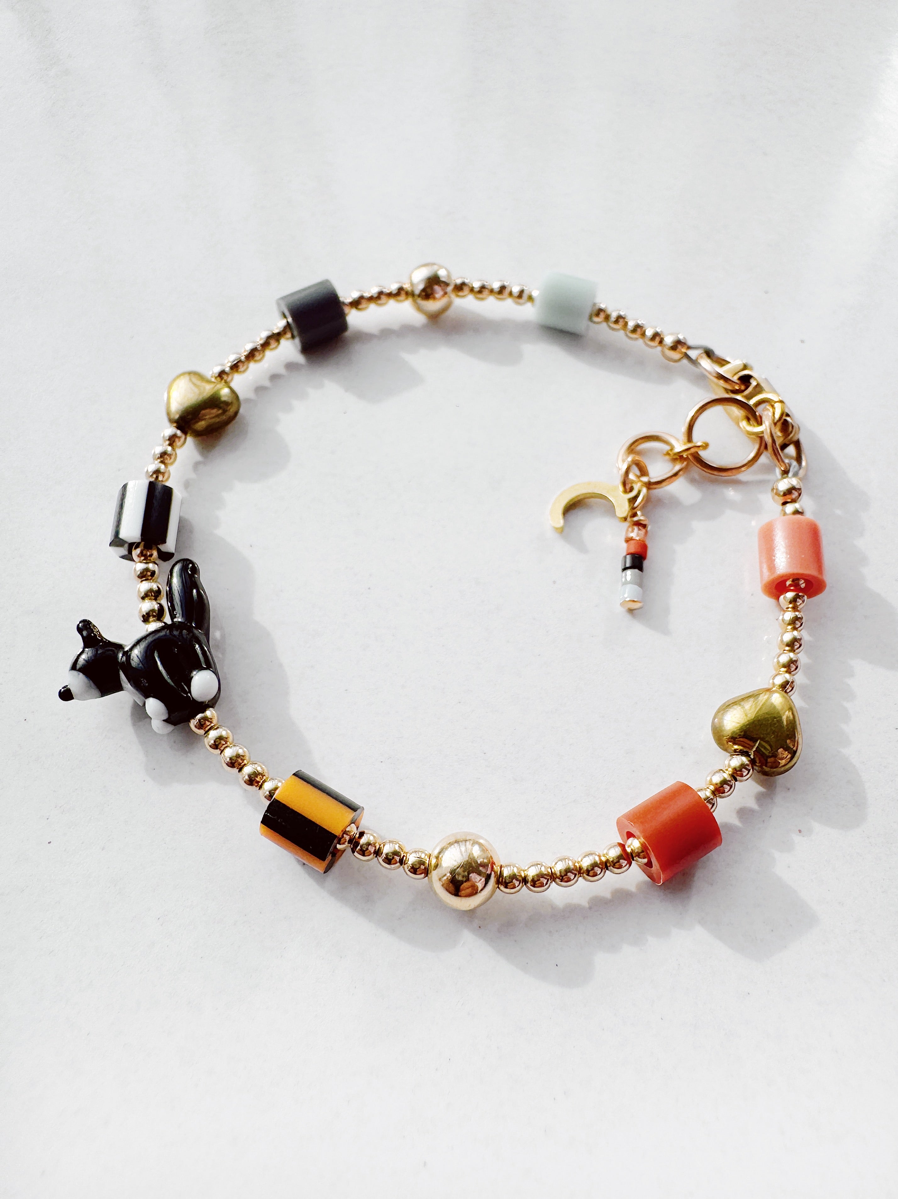 Golden Critter Bracelet - tuxie kitty - dusk / persimmon