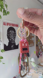 Load and play video in Gallery viewer, RoboLizard Bag Charm - gold / pink
